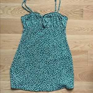 Woman’s green floral dress